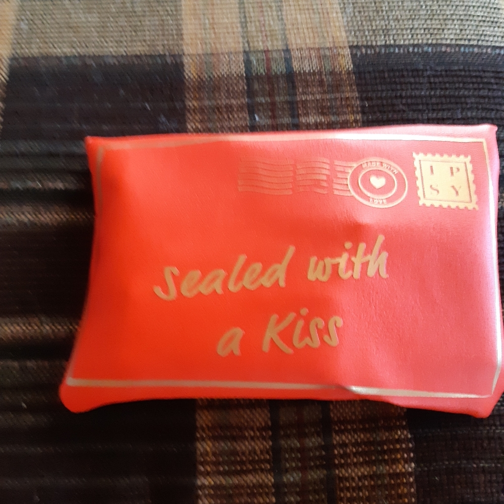 Ipsy bag with four items